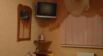 Фото номера Двухместный номер с 2 двуспальными кроватями Гостиница Марисобель г. Нижний Новгород 2