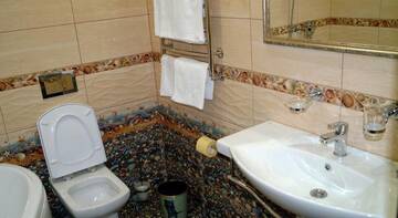 Фото номера Двухместный номер Делюкс с 1 кроватью Гостиница Guest House SV г. Нижний Новгород 3