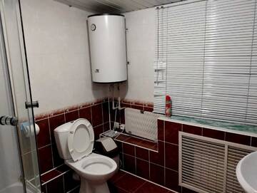 Фото номера Стандартный семейный номер Гостиница Rest Home г. Нижний Новгород 9