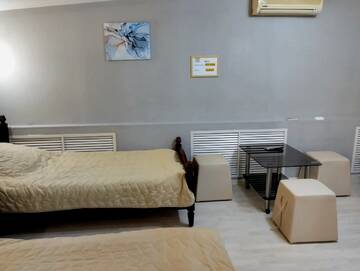 Фото номера Стандартный семейный номер Гостиница Rest Home г. Нижний Новгород 11