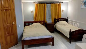 Фото номера Стандартный семейный номер Гостиница Rest Home г. Нижний Новгород 7