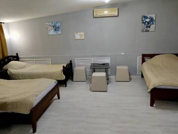 Фото номера Стандартный семейный номер Гостиница Rest Home г. Нижний Новгород 3