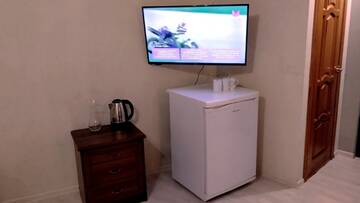 Фото номера Стандартный семейный номер Гостиница Rest Home г. Нижний Новгород 8