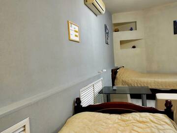 Фото номера Стандартный семейный номер Гостиница Rest Home г. Нижний Новгород 5