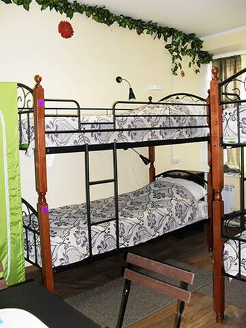 Фото номера Односпальная кровать в номере на 8 человек Хостел Хостел Home Hostel NN г. Нижний Новгород 4