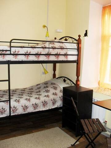 Фото номера Односпальная кровать в в номере на 4 человека Хостел Хостел Home Hostel NN г. Нижний Новгород 6