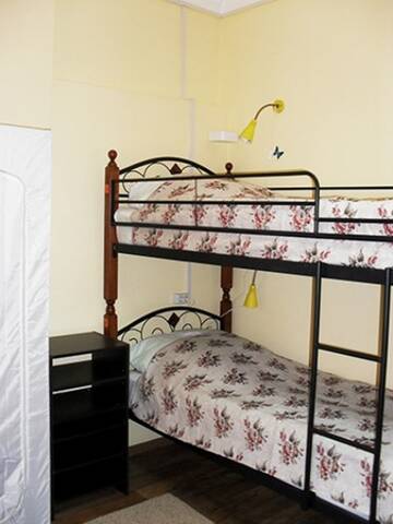 Фото номера Односпальная кровать в в номере на 4 человека Хостел Хостел Home Hostel NN г. Нижний Новгород 7