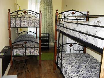 Фото номера Односпальная кровать в в номере на 4 человека Хостел Хостел Home Hostel NN г. Нижний Новгород 2